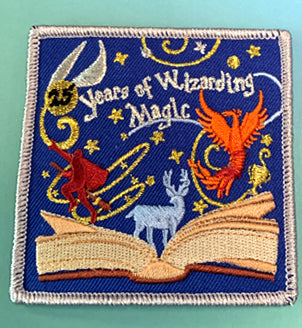 Wizarding World of Adventures ( attach charms from bracelet kit)